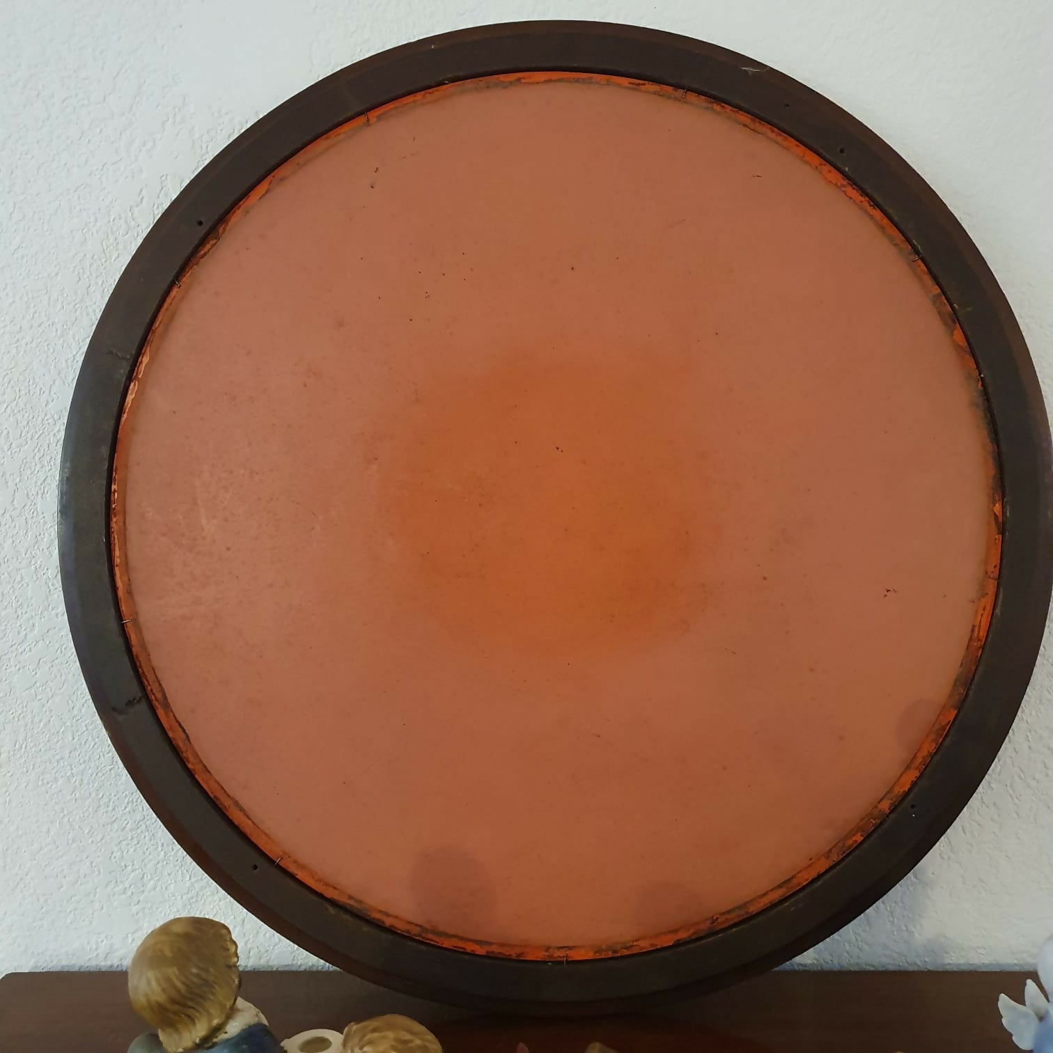 Espelho redondo com moldura em madeira nobre, anos 60.