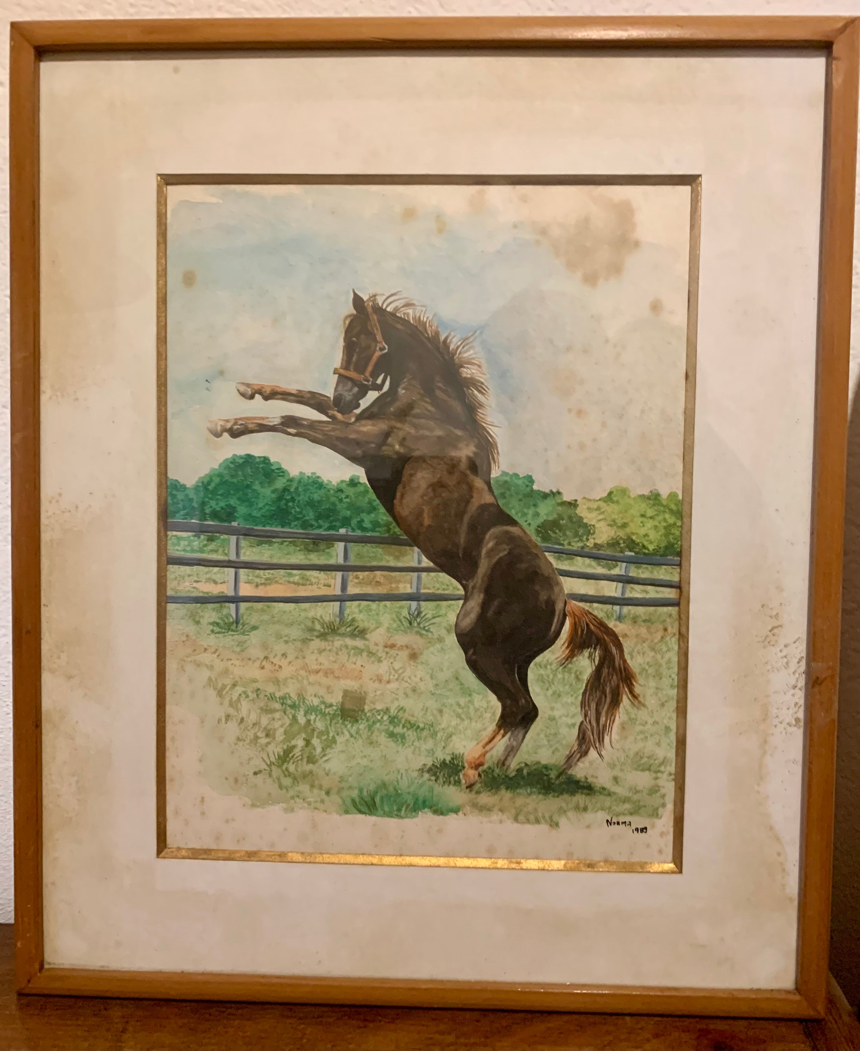 Quadro com antiga aquarela representando um belo cavalo marrom 