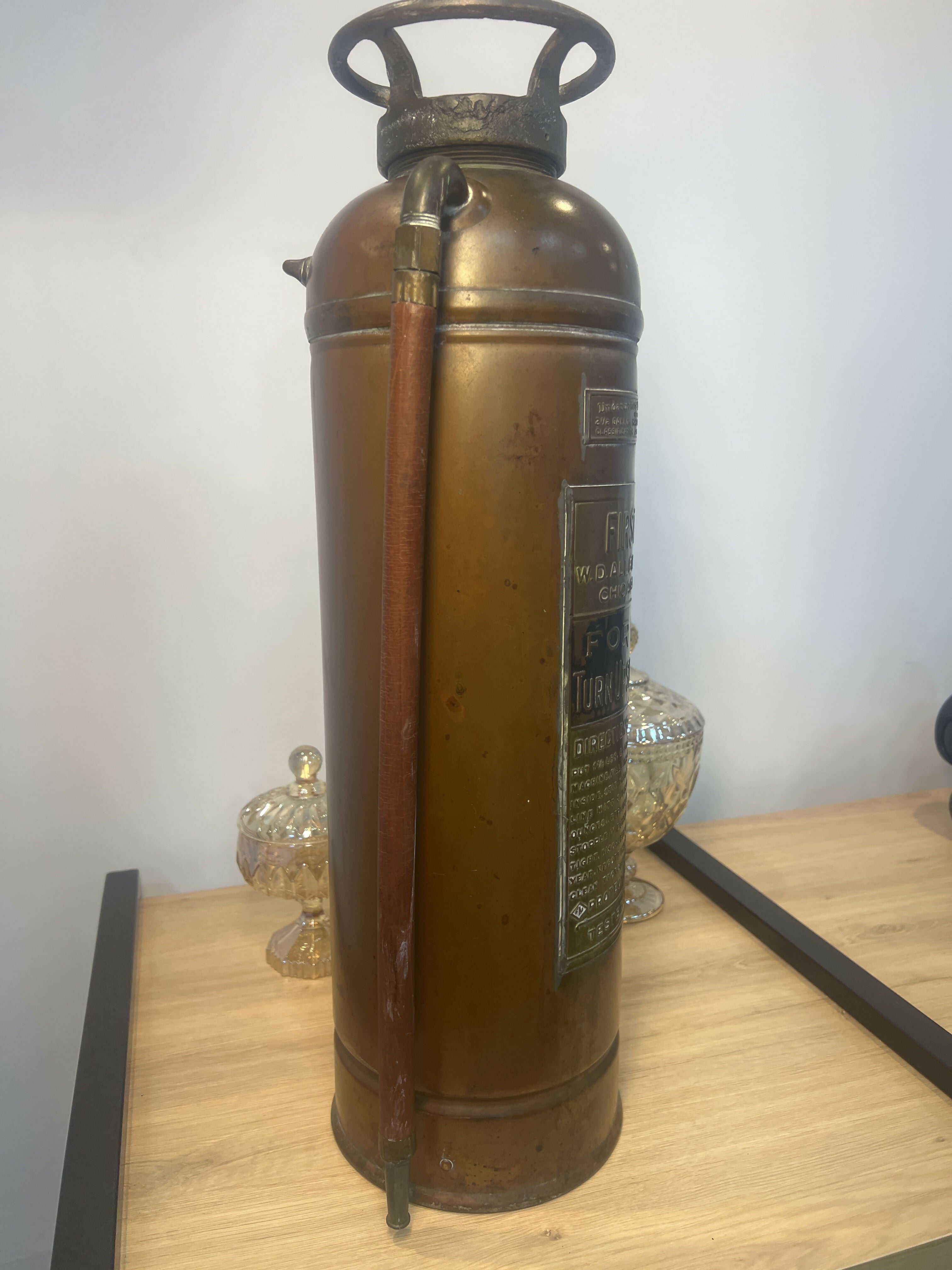 Extintor EUA do início do século latão e cobre