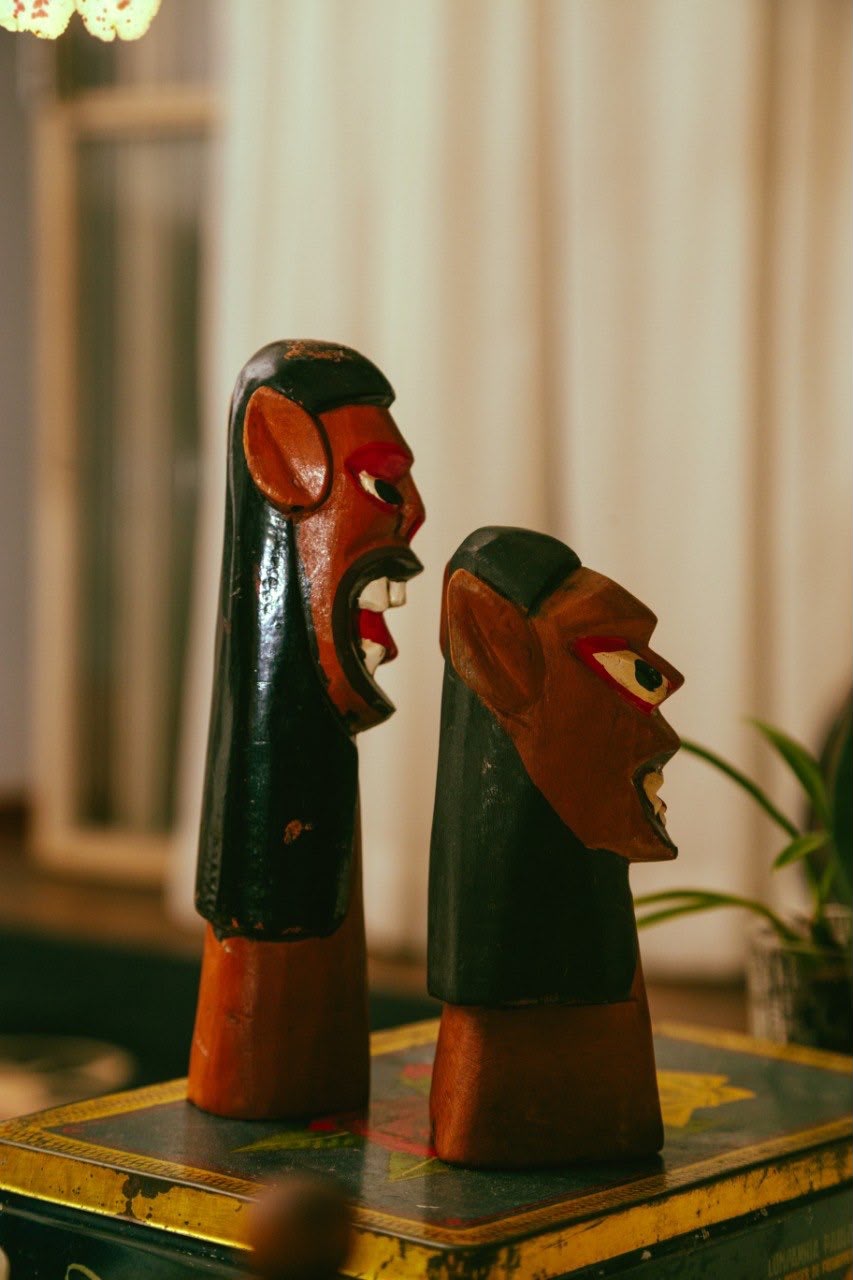 dupla de carrancas de madeira
