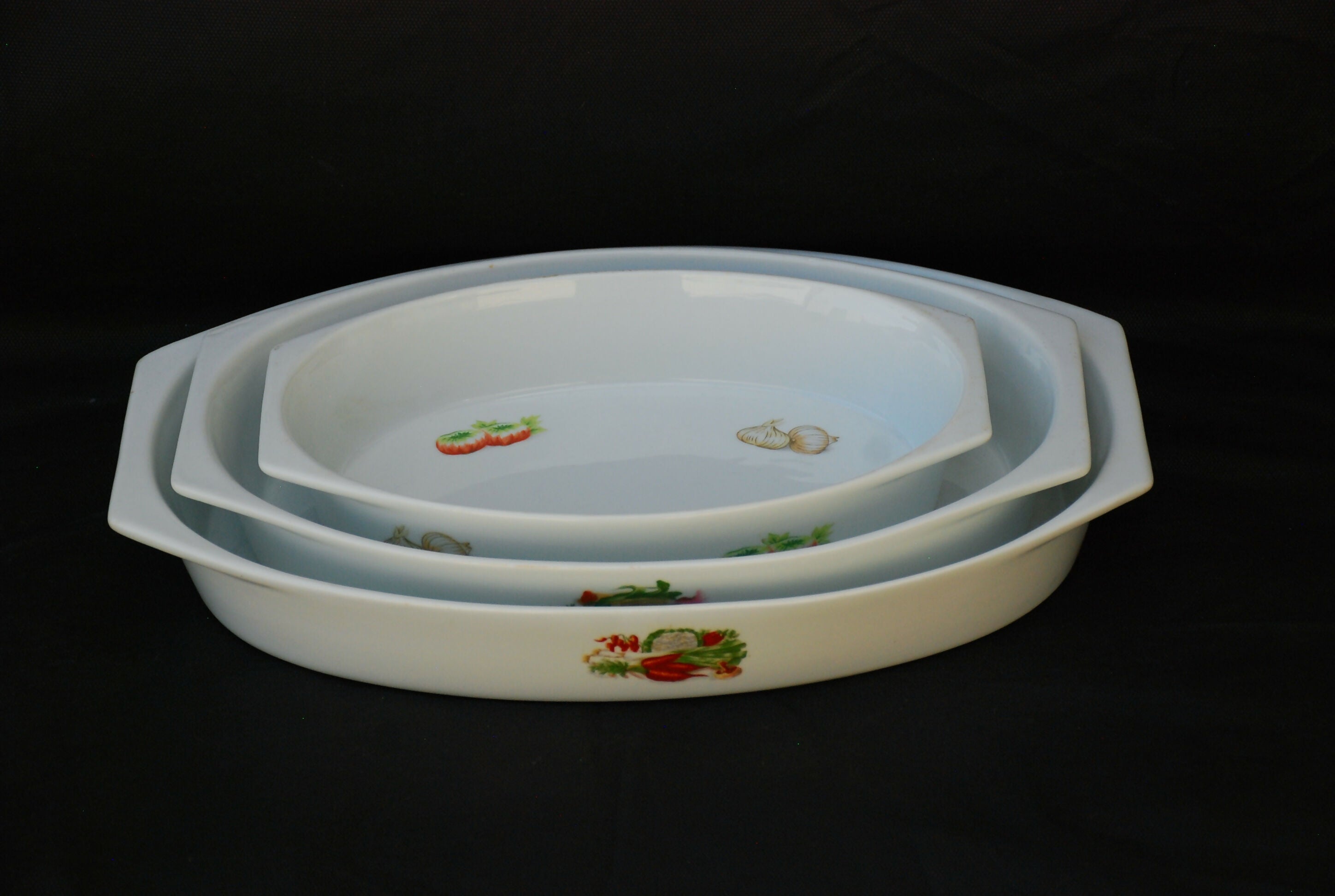 jogo travessas refratarias porcelana real .- 95