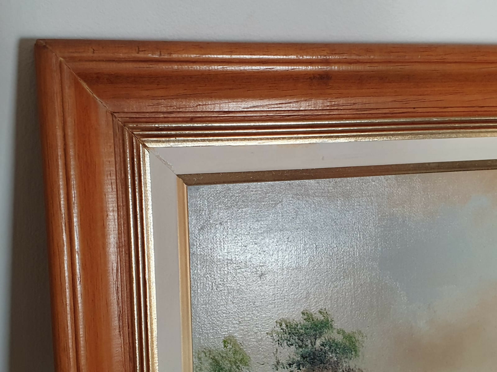 Quadro, pintura, óleo sobre tela, representando paisagem lacustre e casario, assinado frente e verso por Ivo Blasi.