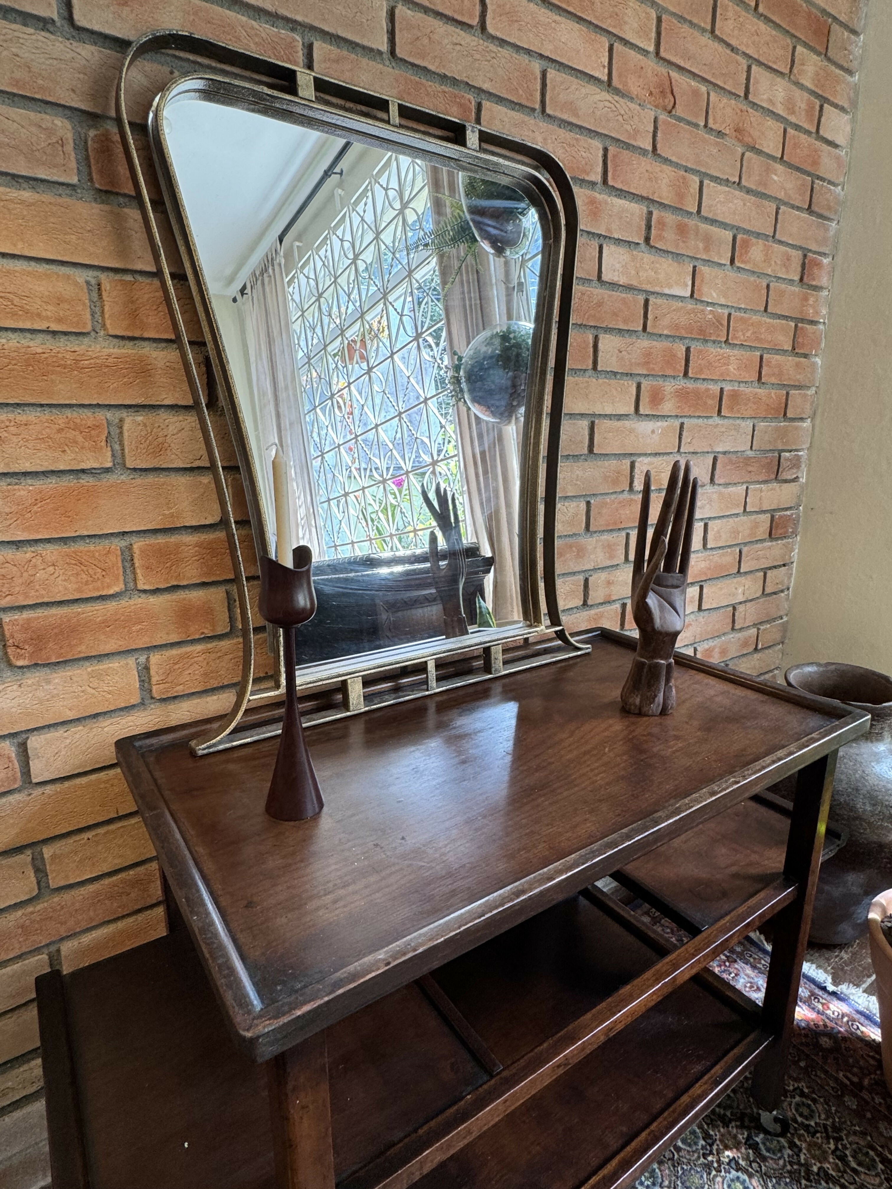 Espelho ArtDeco em metal com pátina dourada