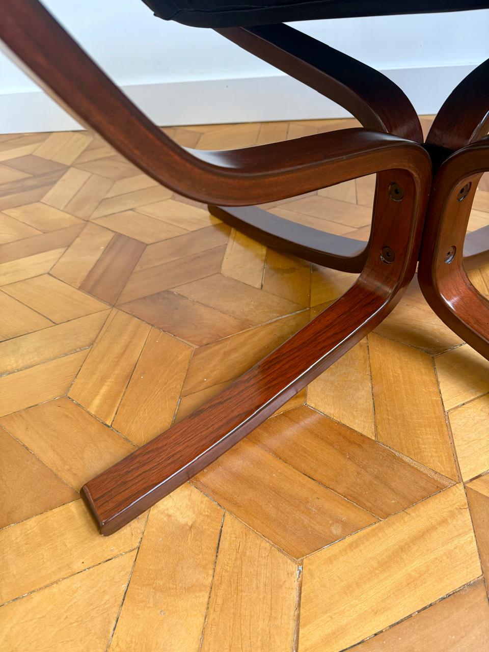 Poltrona Falcon - Sirgud Ressell em couro natural preto 