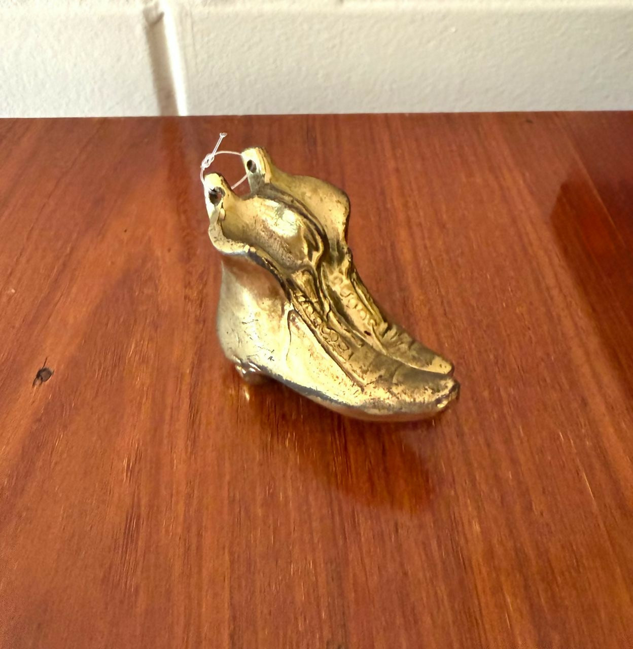 Escultura em PETIT BRONZE representando o menino da flauta