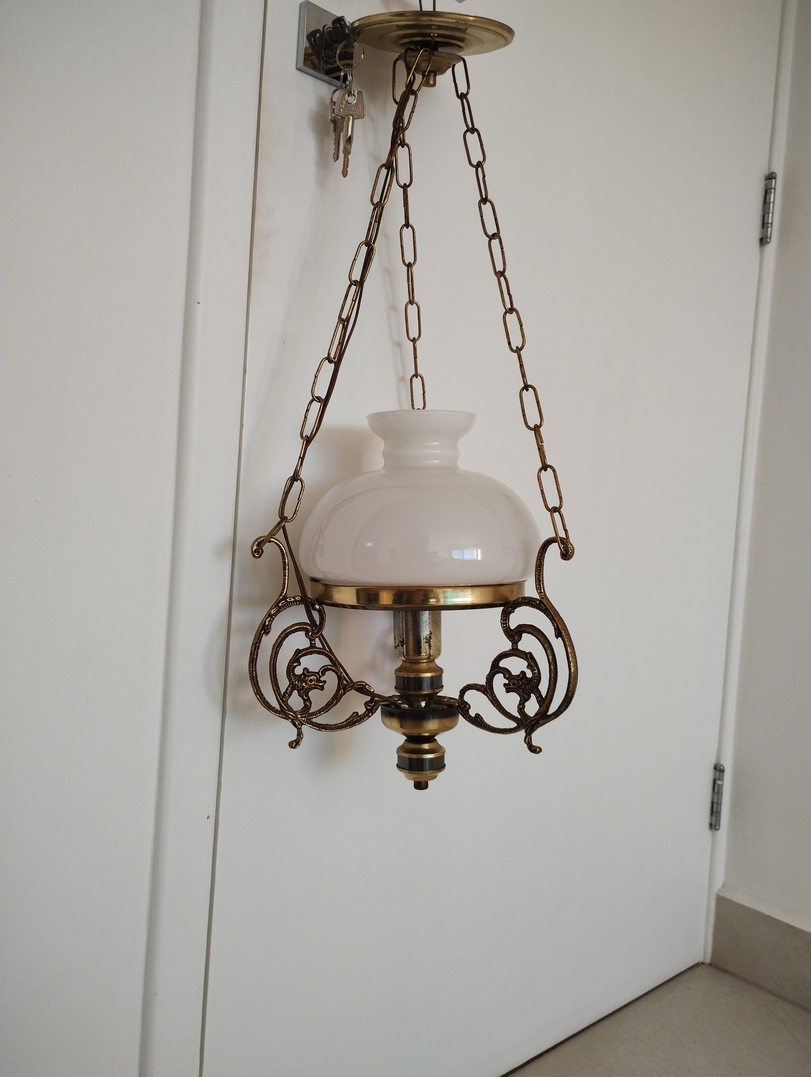 Lustre antigo em bronze