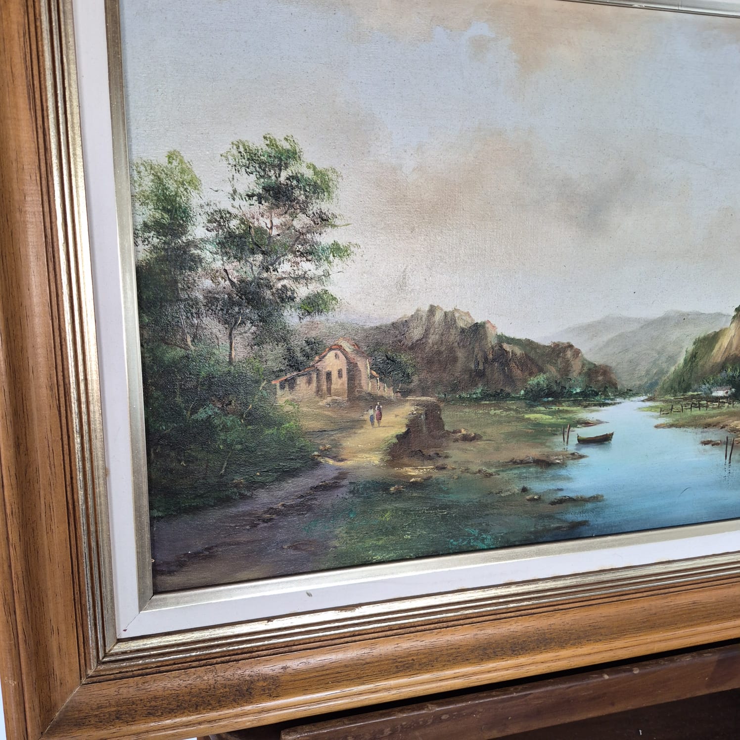 Quadro, pintura, óleo sobre tela, representando paisagem lacustre e casario, assinado frente e verso por Ivo Blasi.