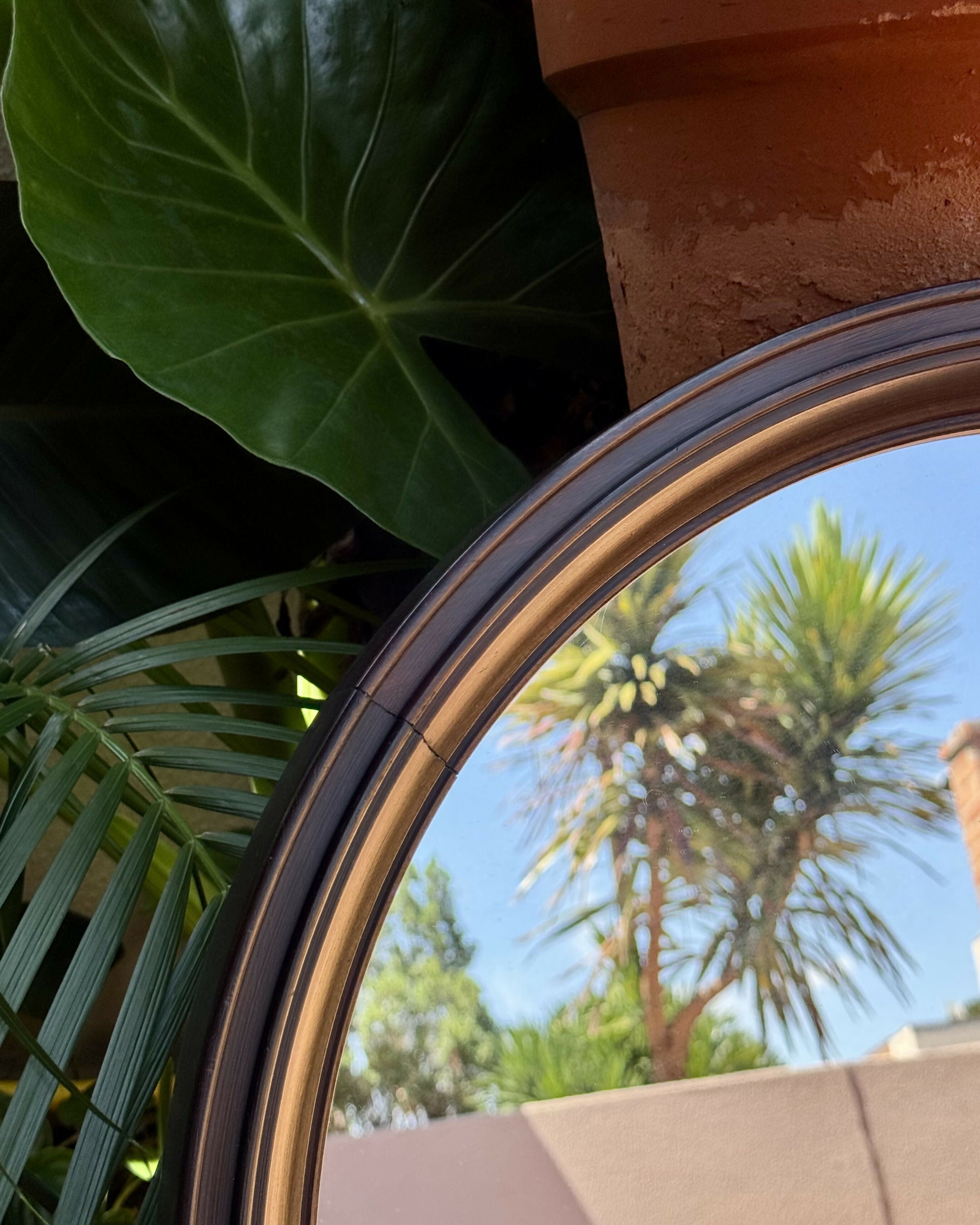 Espelho redondo em jacarandá