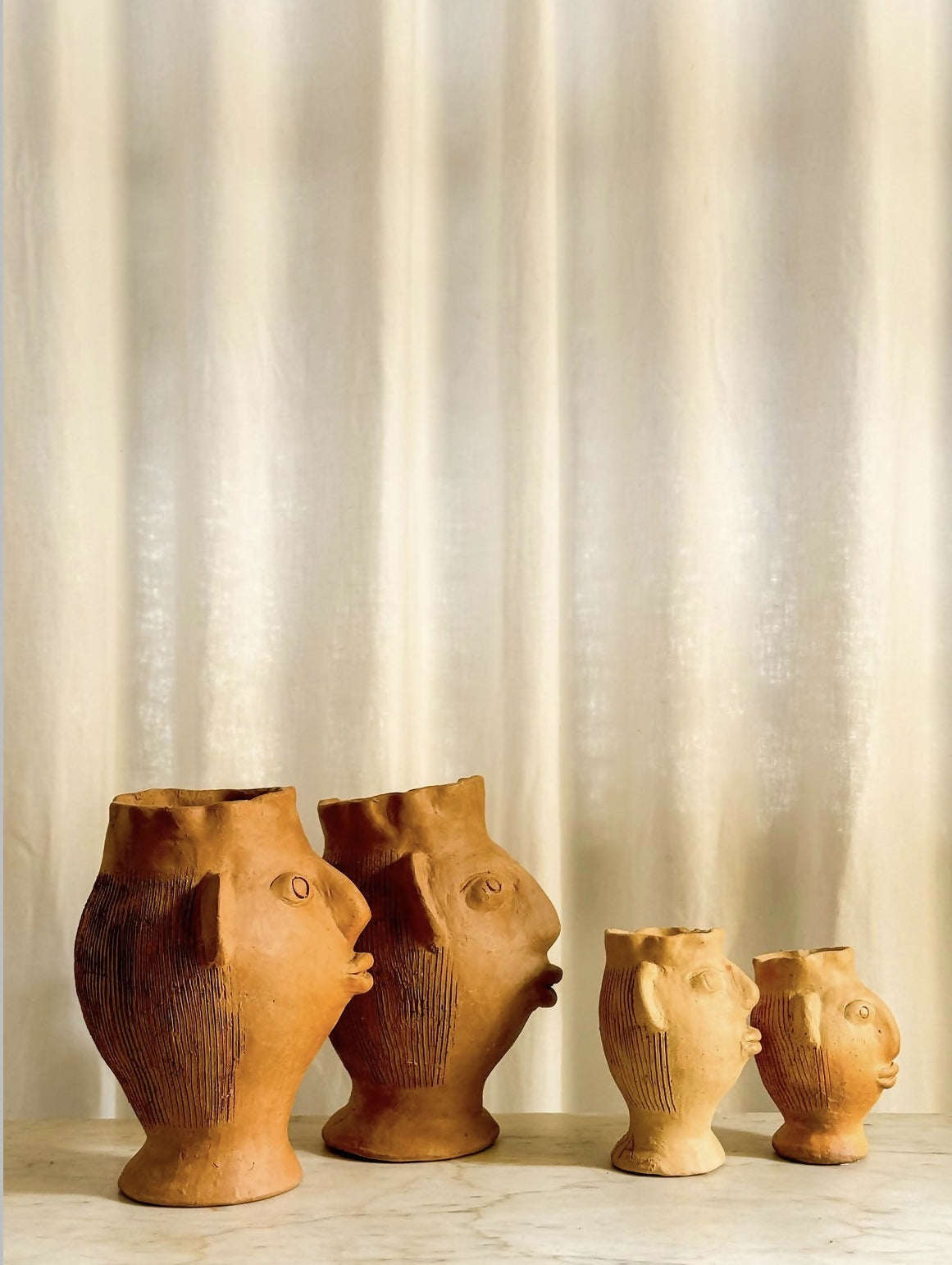 Cabeças vaso, Mestre Irinéia