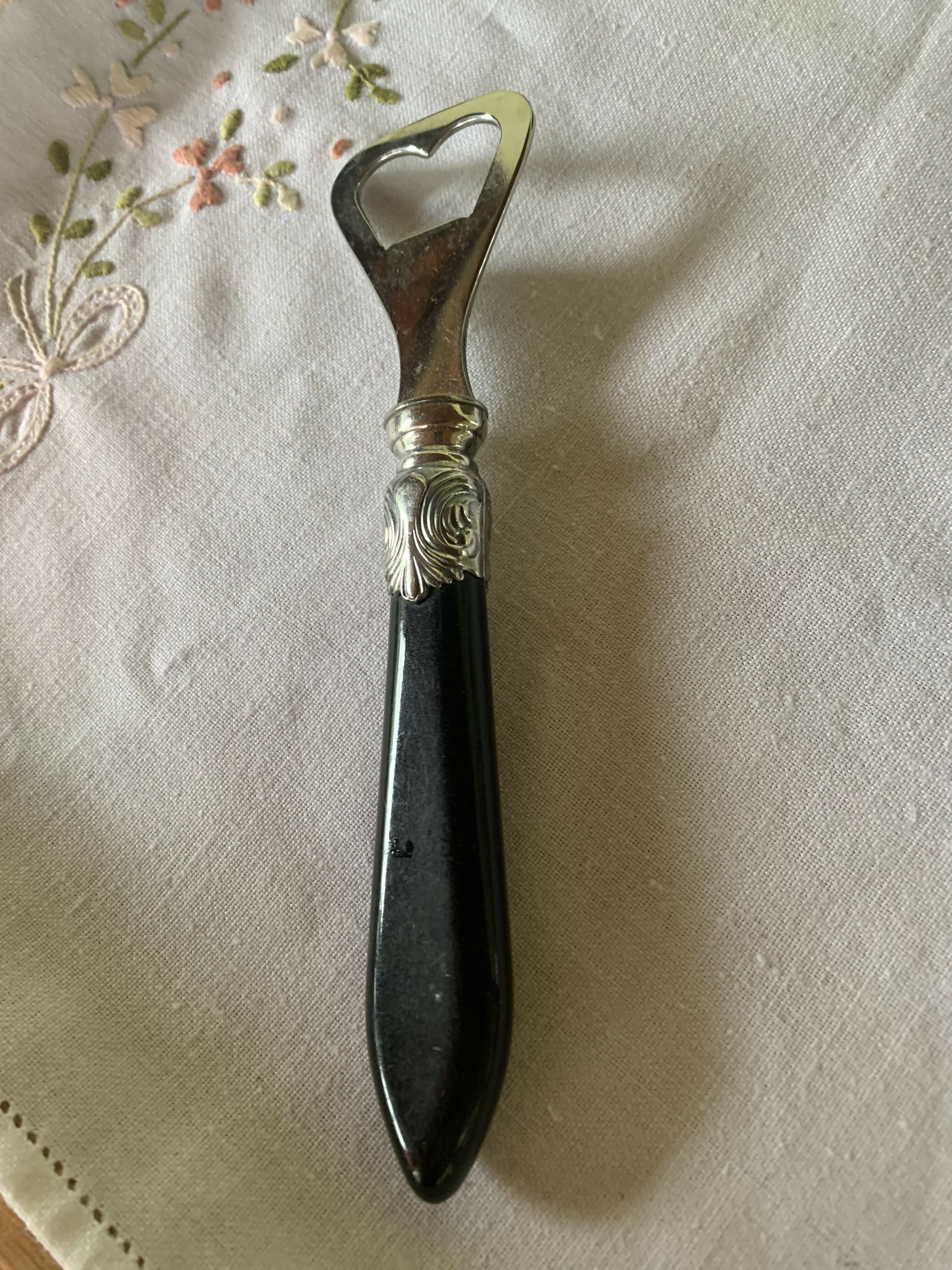 Abridor de garrafa antigo prata