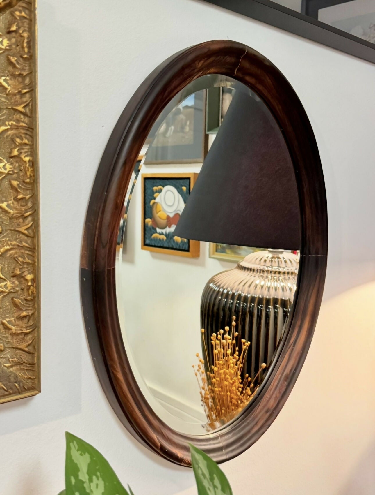 Espelho oval em jacarandá