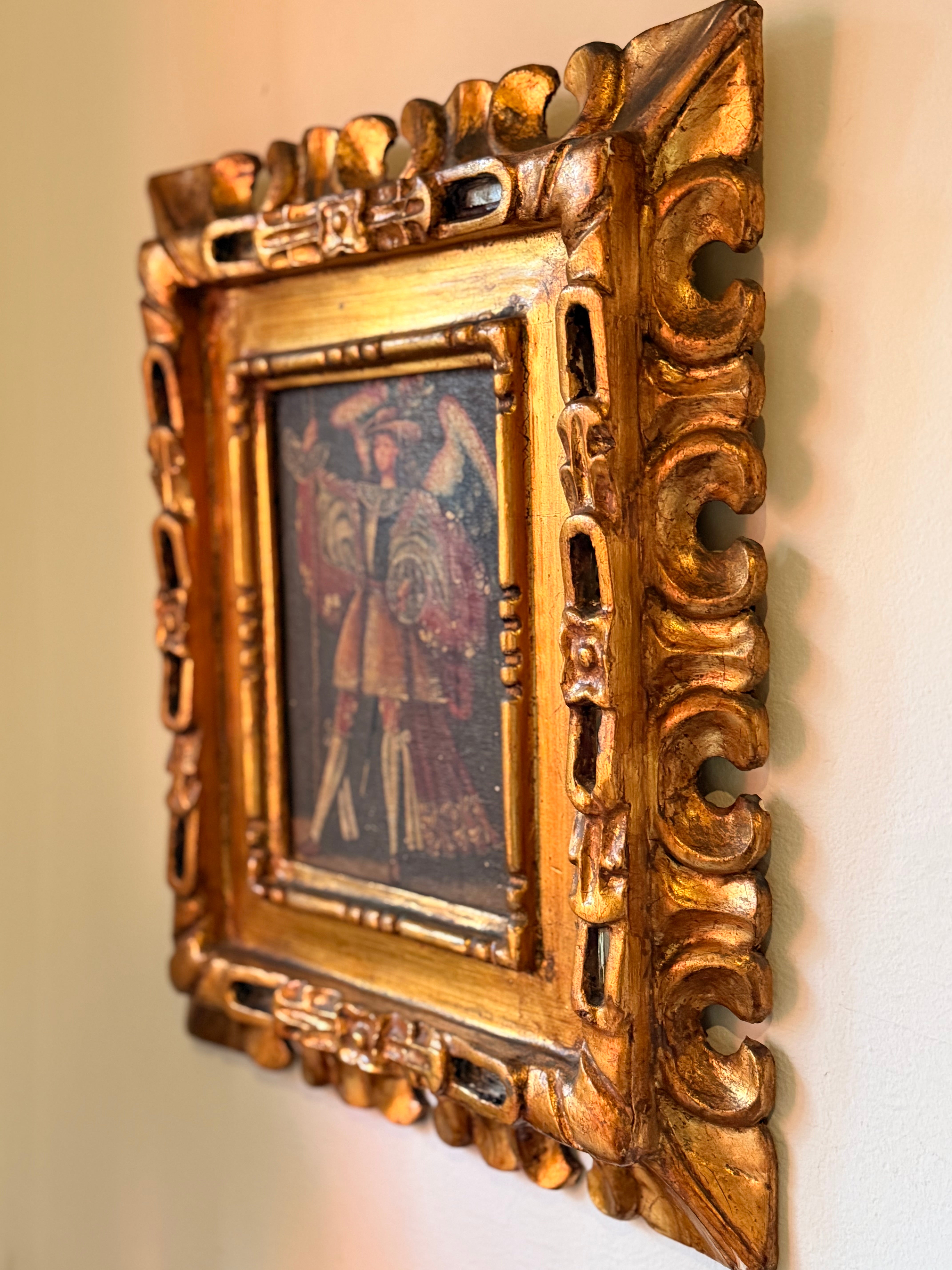 Quadro São Miguel Arcanjo em moldura dourada 