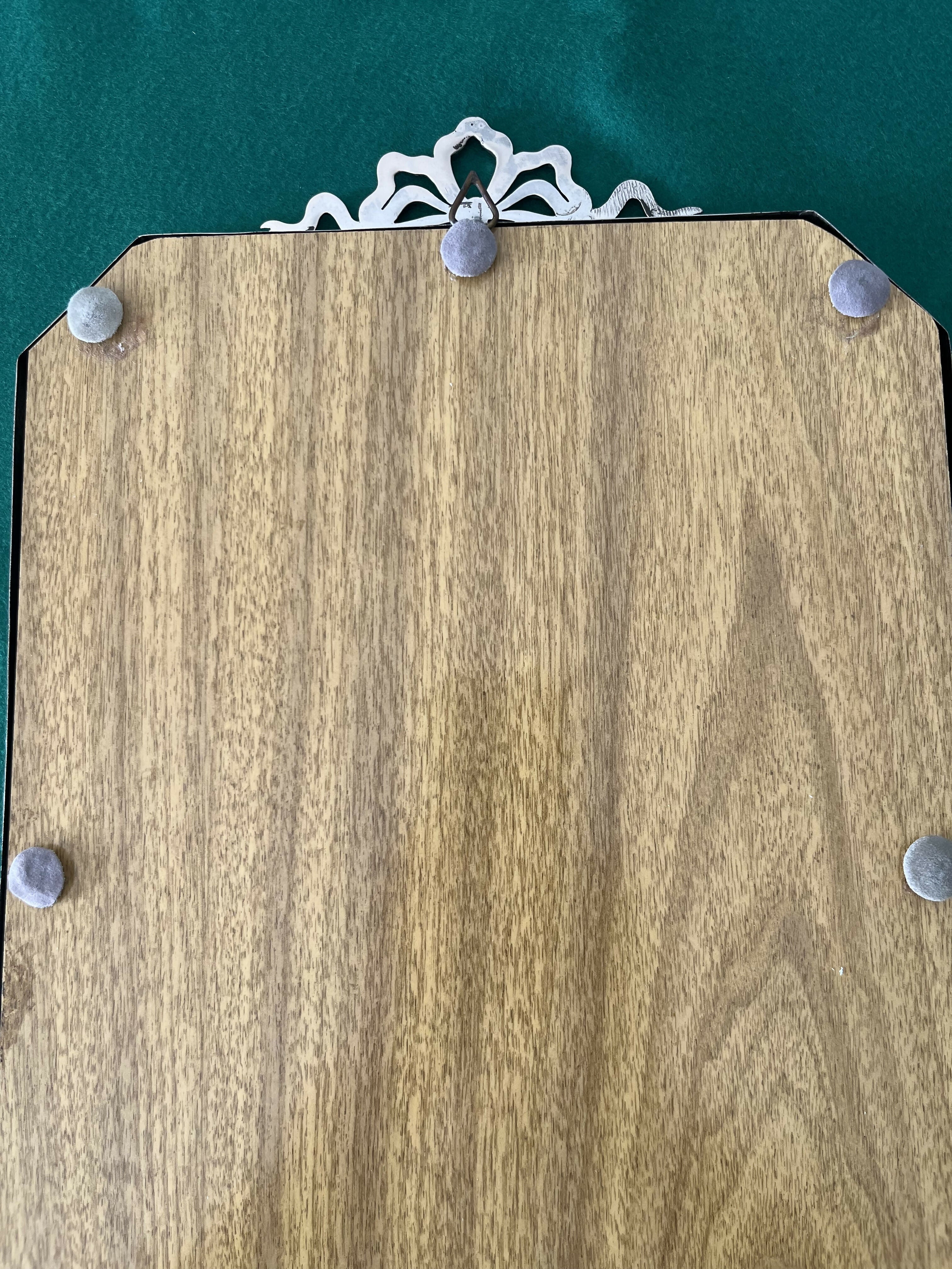 Espelho com moldura de prata