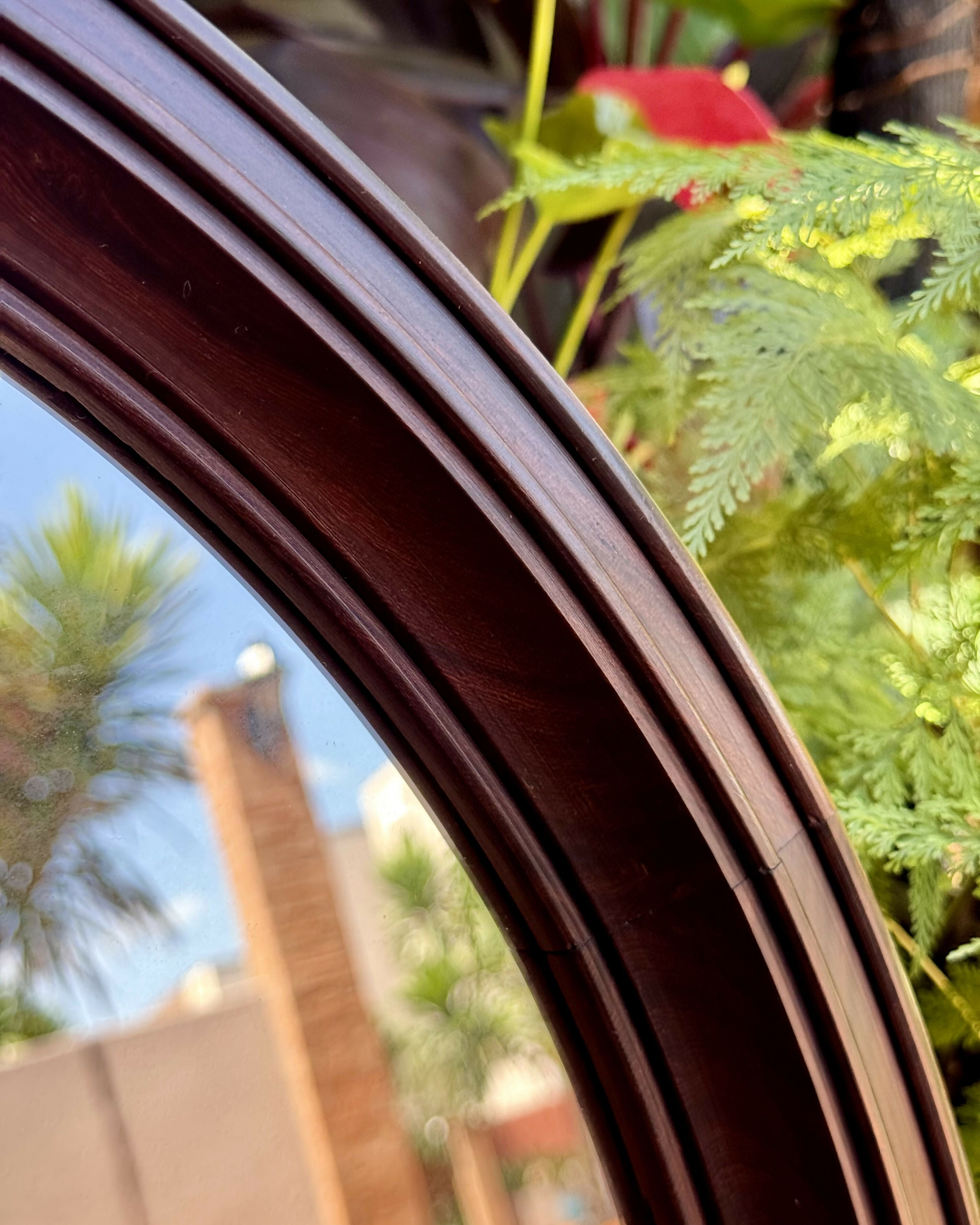 Espelho redondo em jacarandá