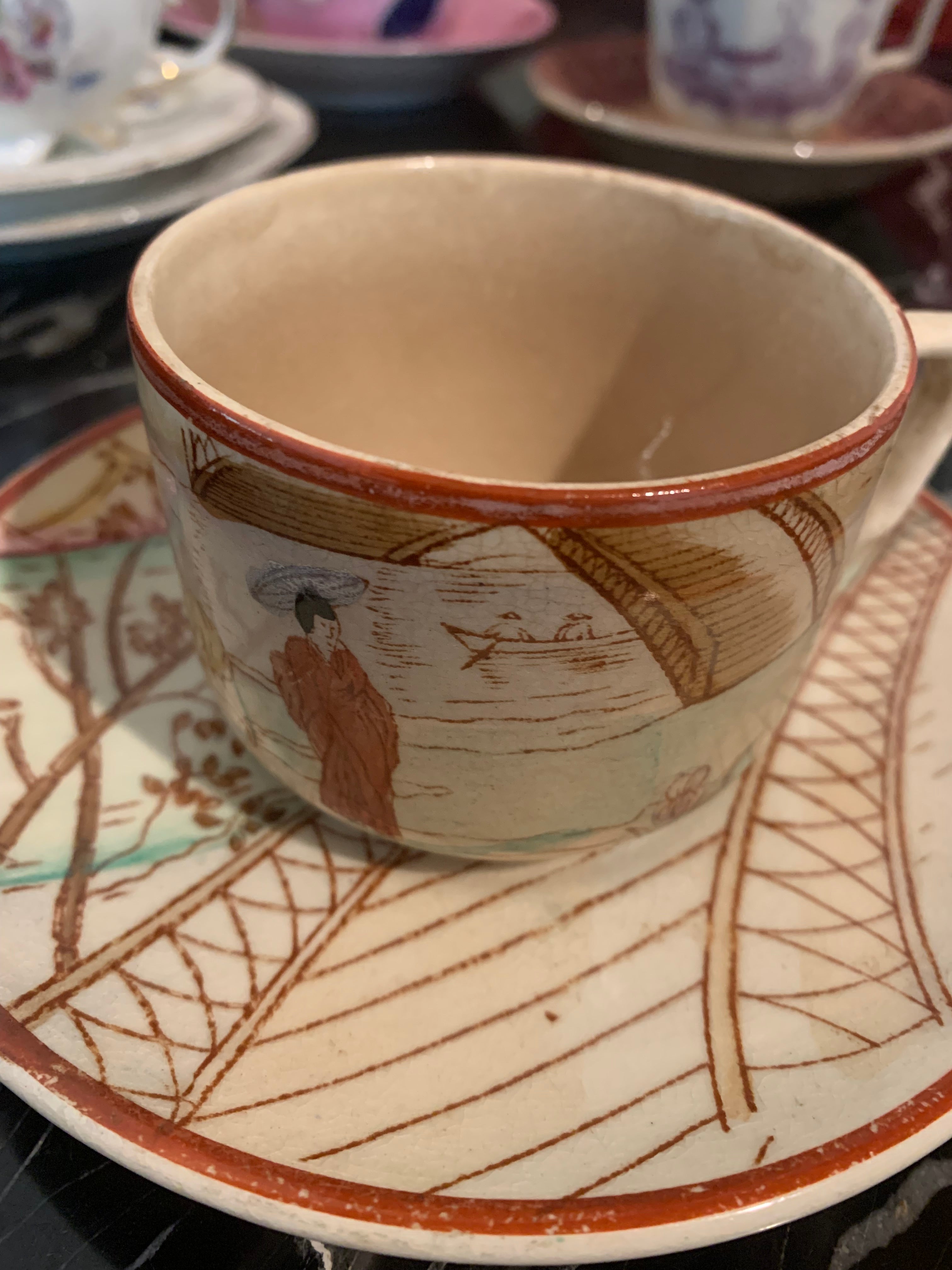 Lindíssima e muito antiga xícara de chá de porcelana com pintura a mão com tema oriental