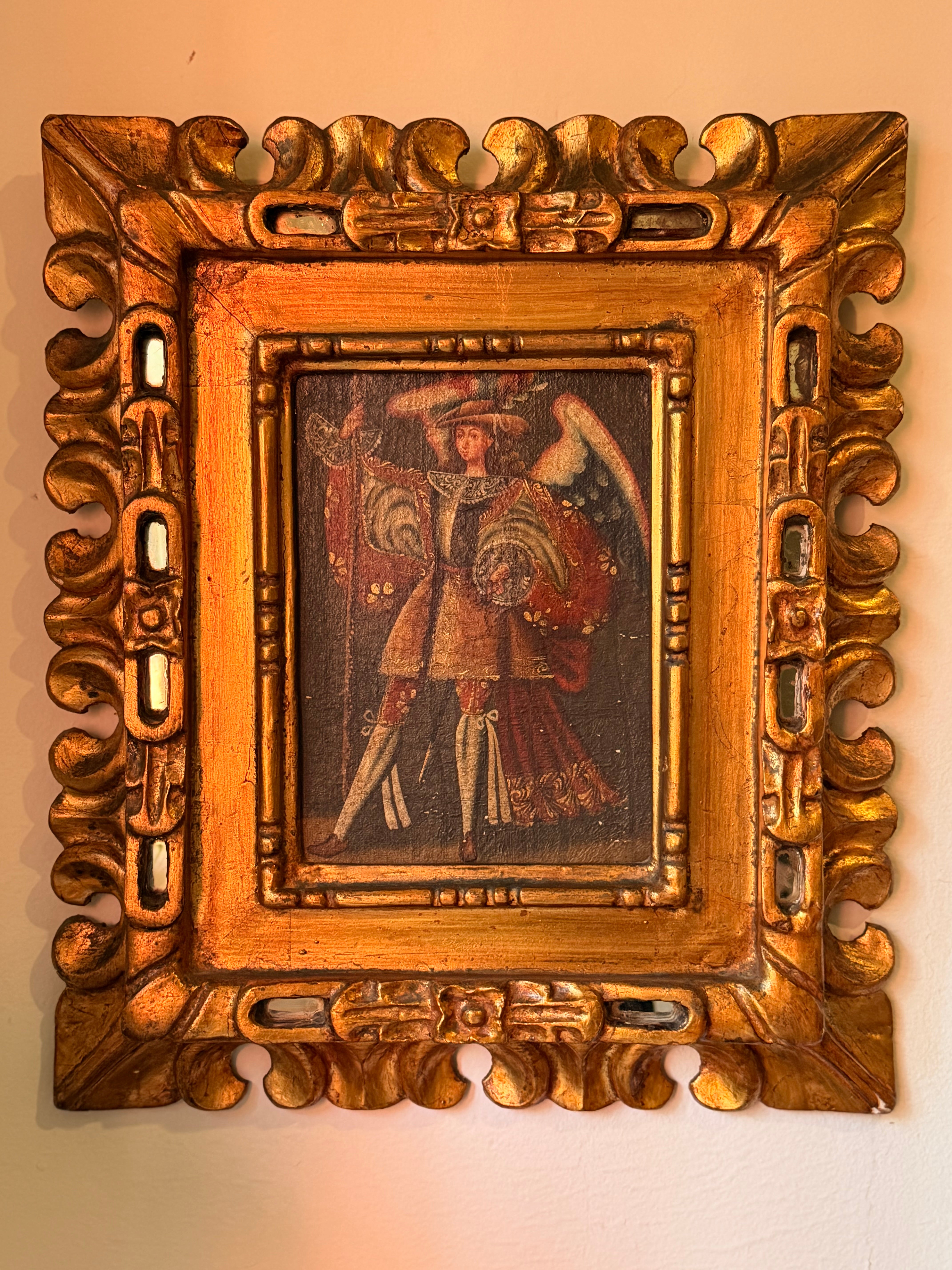 Quadro São Miguel Arcanjo em moldura dourada 