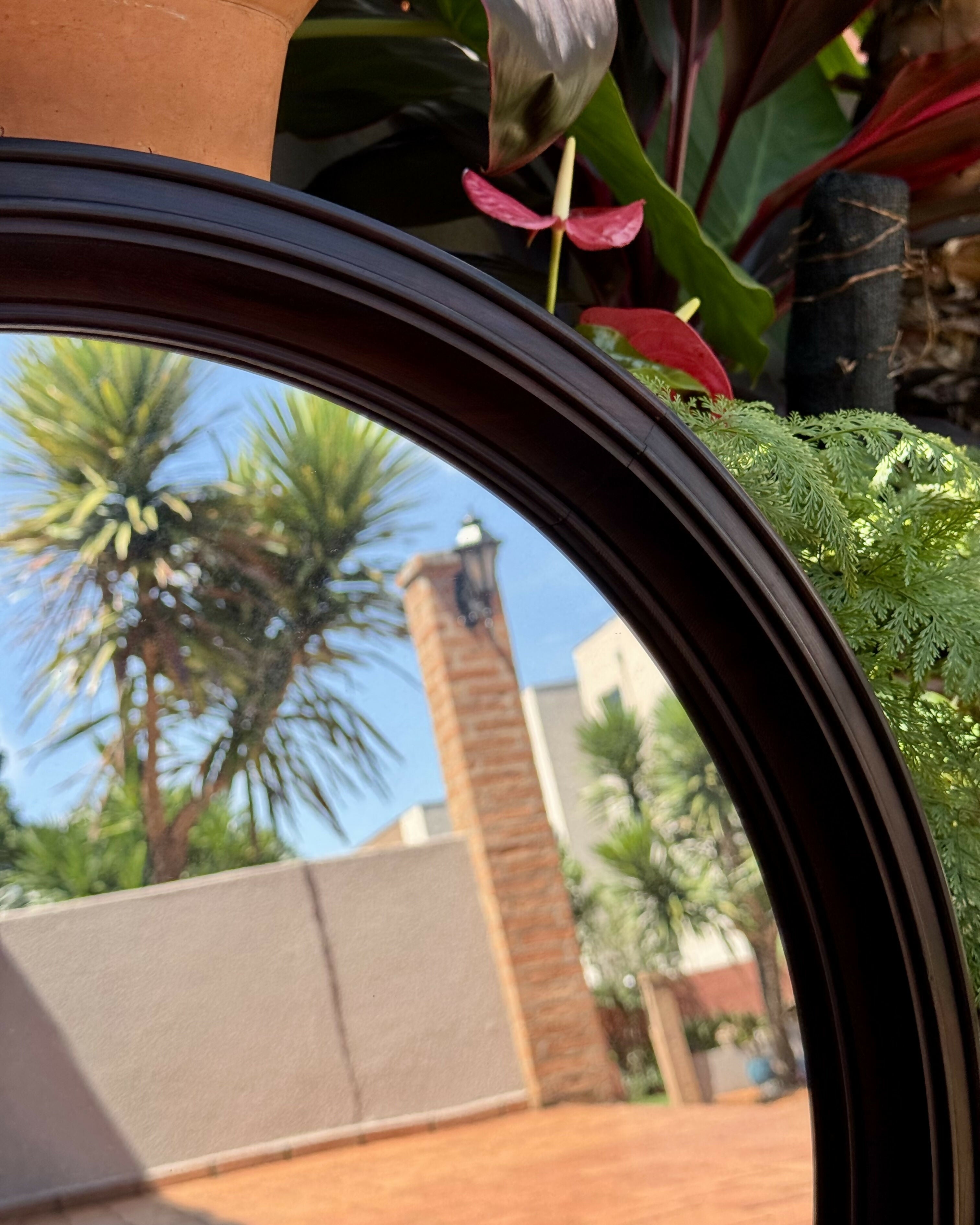 Espelho redondo em jacarandá