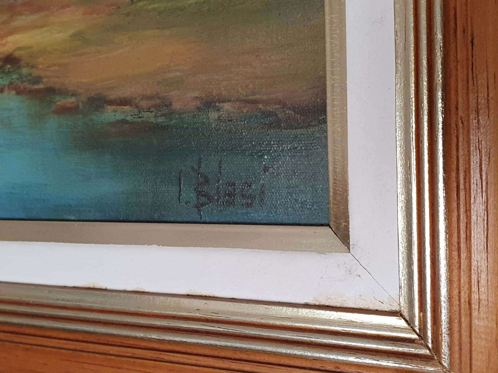 Quadro, pintura, óleo sobre tela, representando paisagem lacustre e casario, assinado frente e verso por Ivo Blasi.