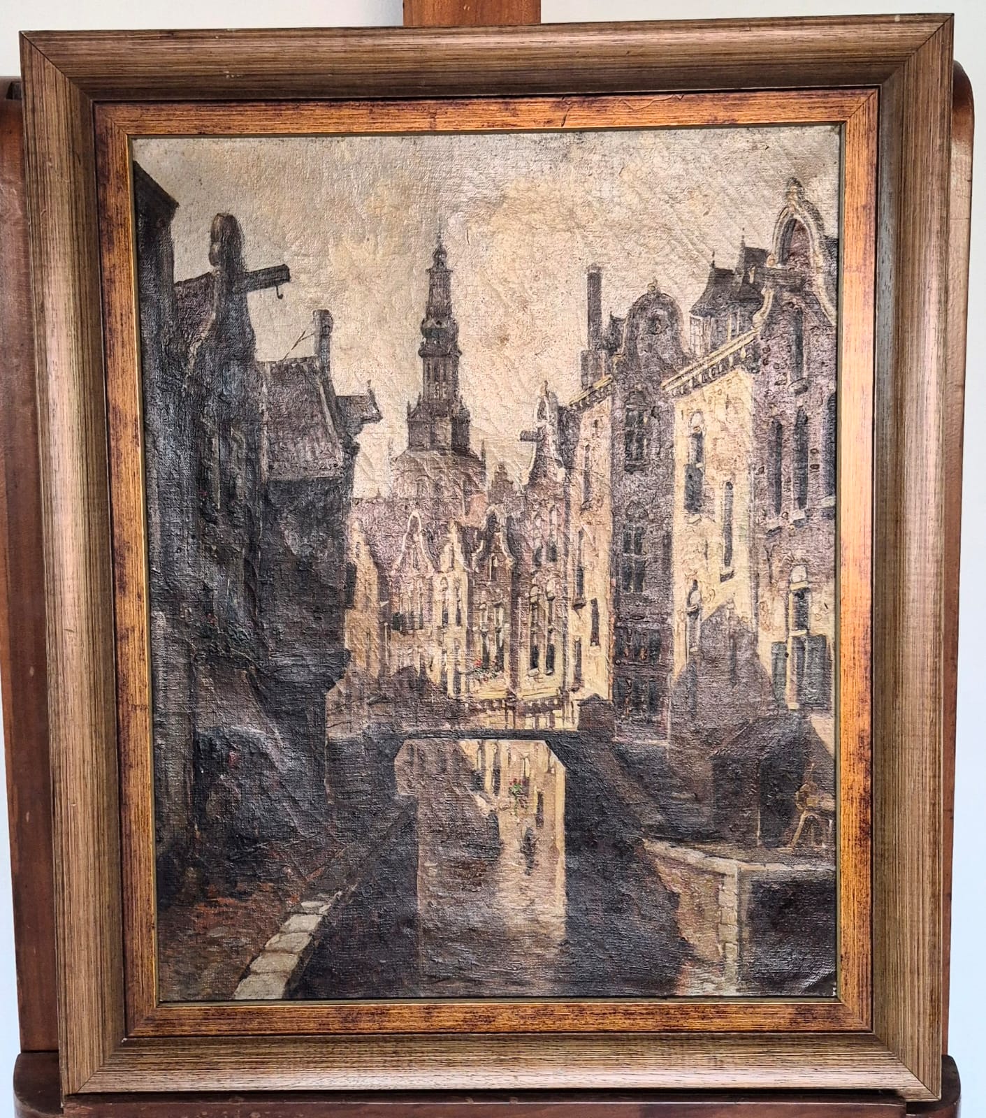 Quadro com pintura óleo sobre tela, atribuído a C. Shuyler, obra intitulada "Paisagem Urbana com Canal".