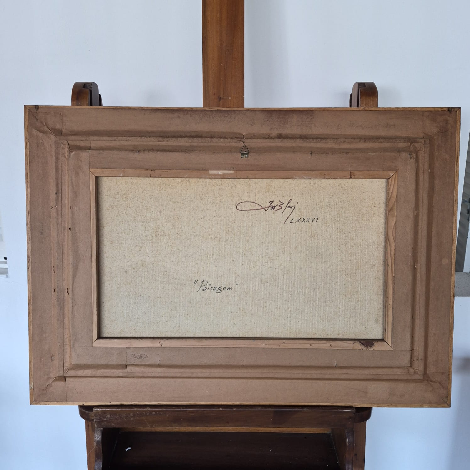 Quadro, pintura, óleo sobre tela, representando paisagem lacustre e casario, assinado frente e verso por Ivo Blasi.