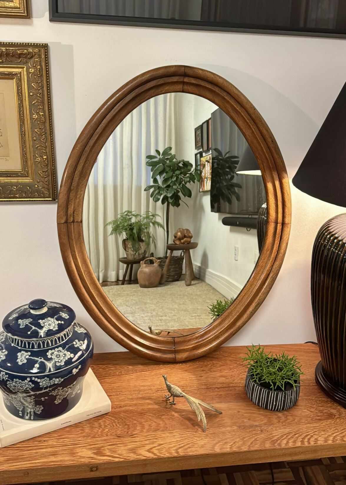 Espelho oval em madeira nobre