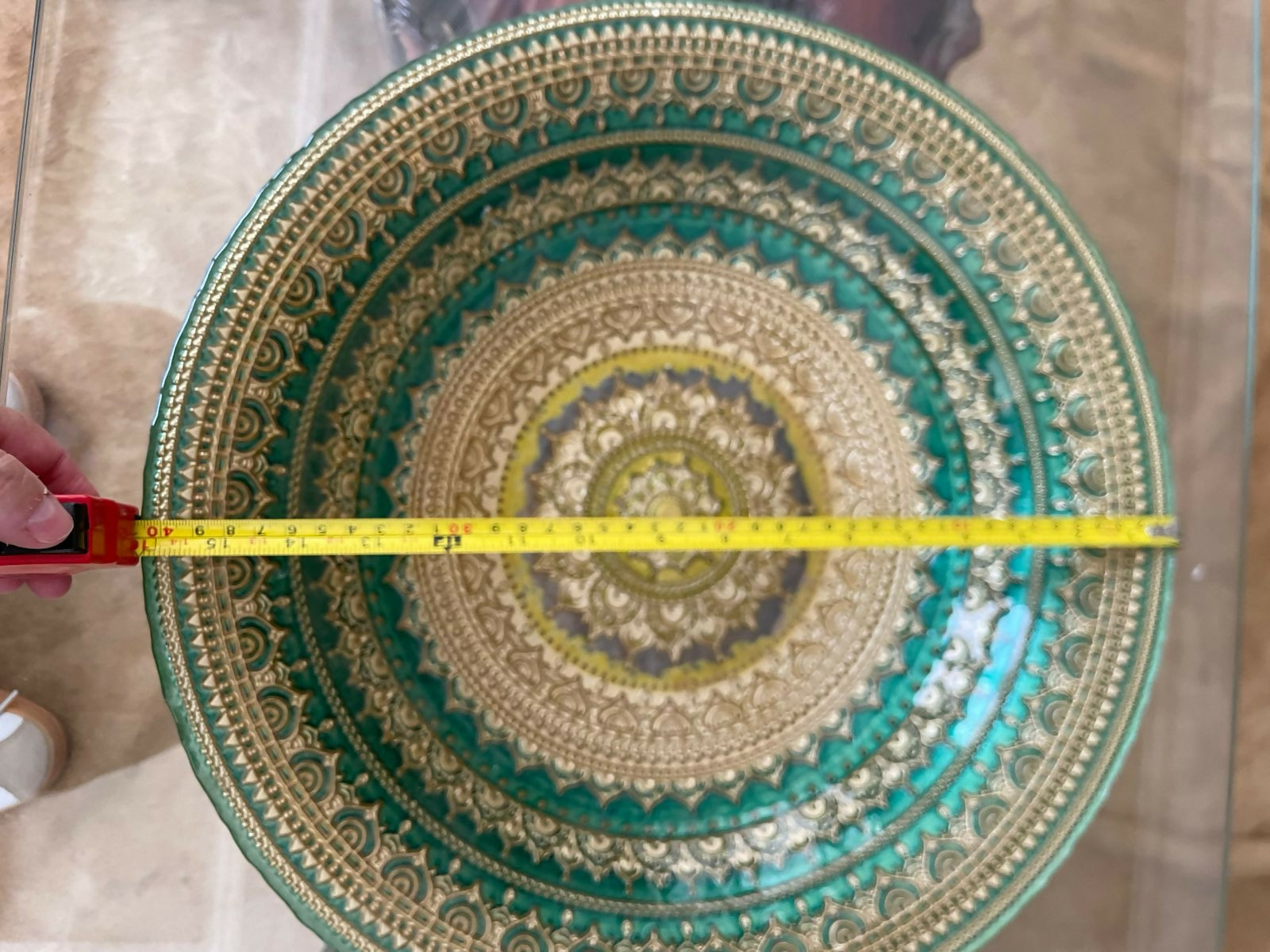 Centro de mesa verde e dourado