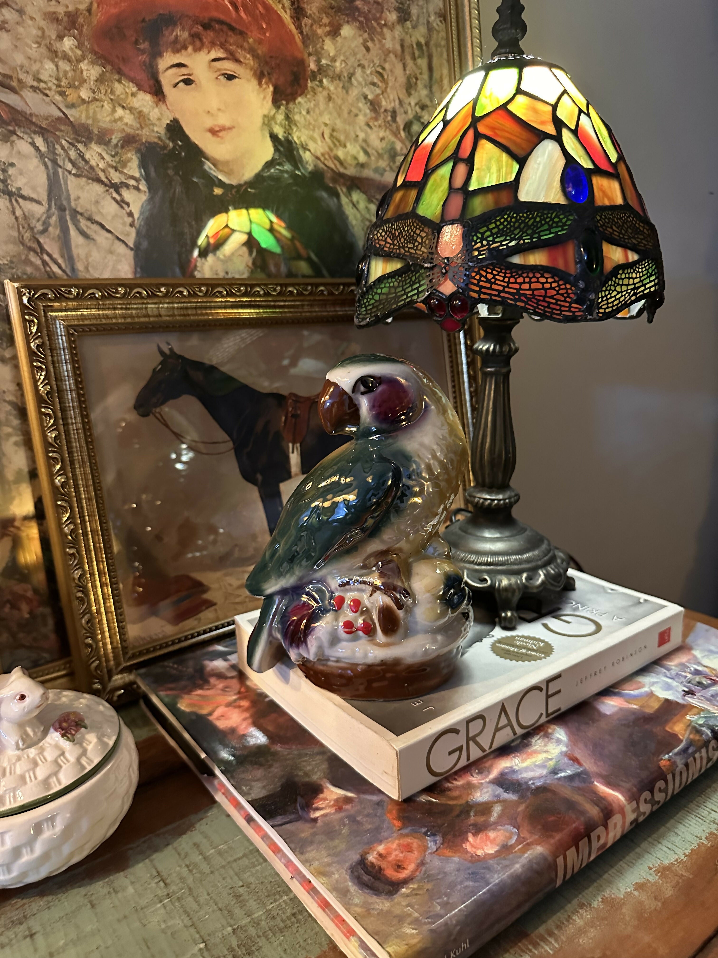 Estatueta antiga de porcelana vitrificada de papagaio