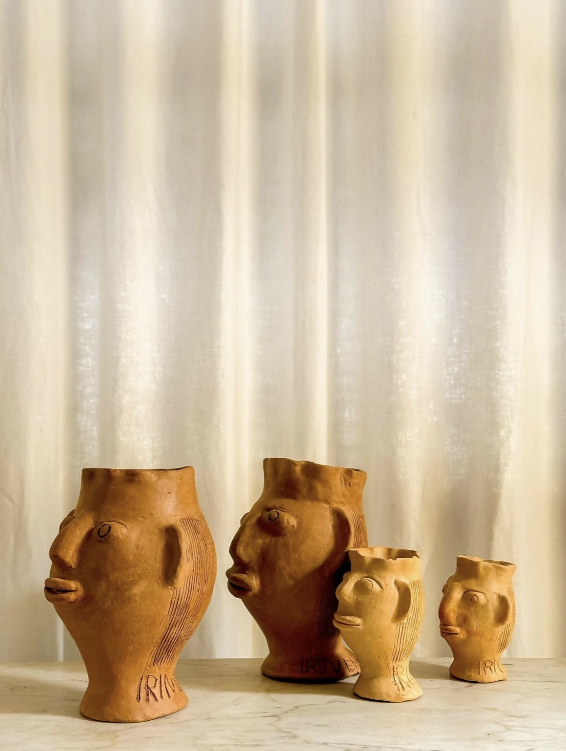 Cabeças vaso, Mestre Irinéia