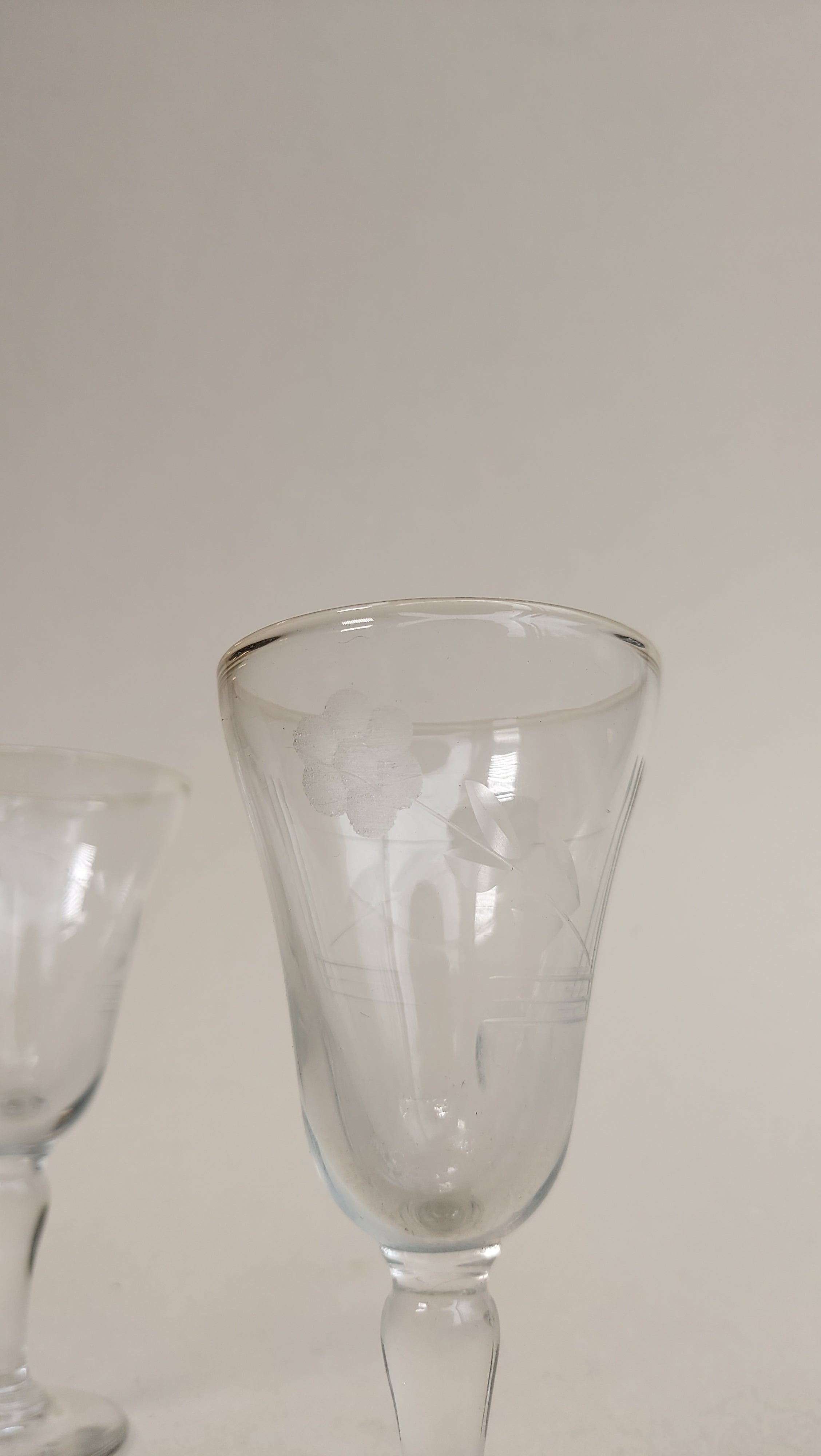 Pair of floral-cut glass liqueur glasses
