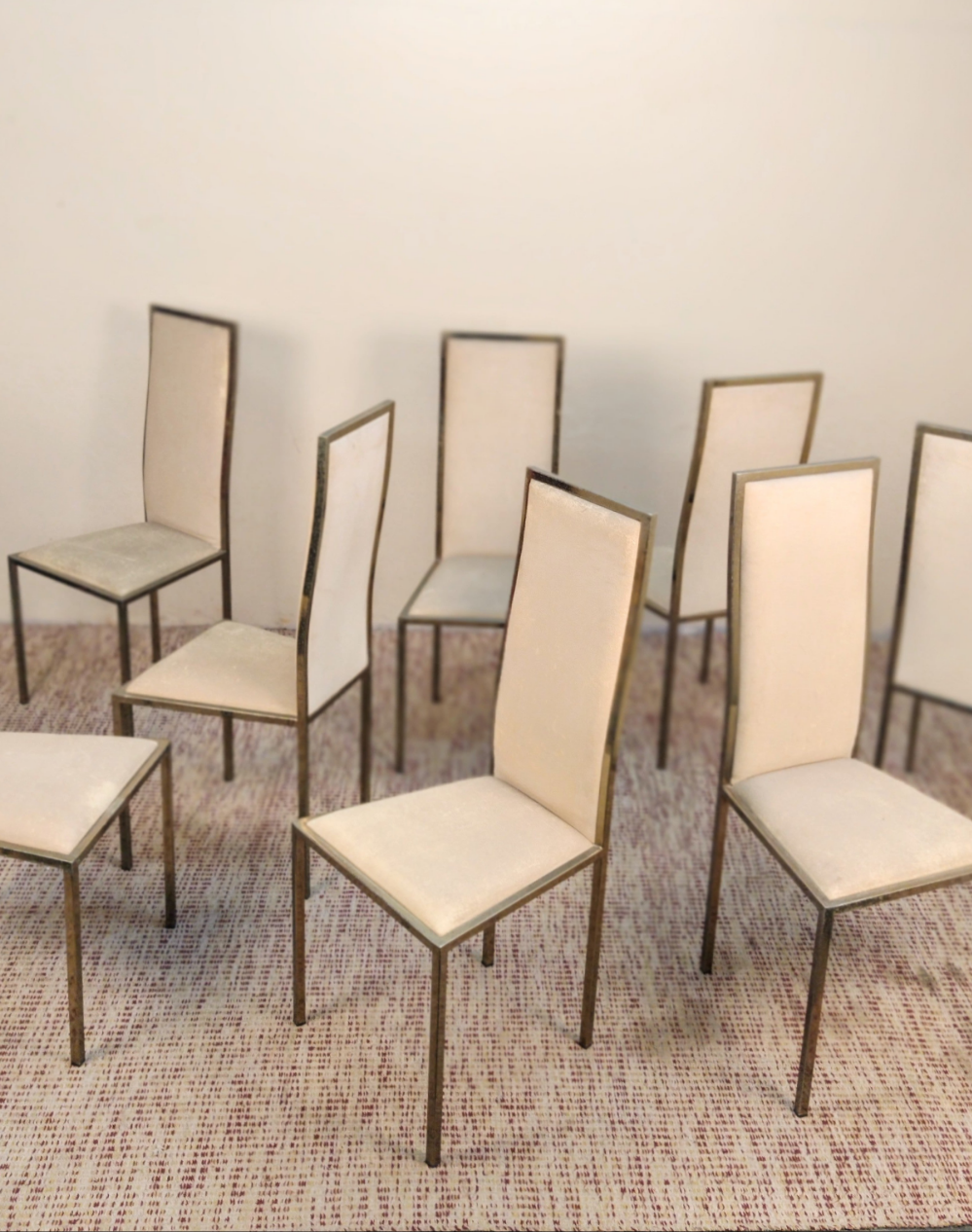 Octet of chairs from the 80s in gold metal and suede